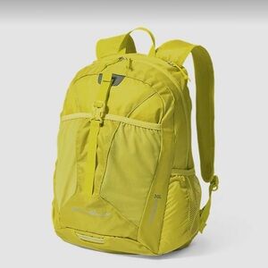 Eddie Bauer stowaway 30 liter yellow backpack.  Folds into its own pouch!